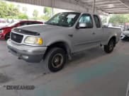 ✅ 2003 Ford F-150 XL • VIN: 2FTRX18W03CA23003 • Lot: 42403479. Listed on IAAI with 316,789 mi. Free auction sales archive from the USA and detailed vehicle history report at DreamBid. Image 2.