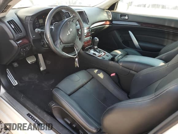 ✅ 2015 Infiniti Q60 S Limited • VIN: JN1CV6EK7FM870604 • Lot: 74284423. Listed on Copart with 81,779 mi. Free auction sales archive from the USA and detailed vehicle history report at DreamBid. Image 7.