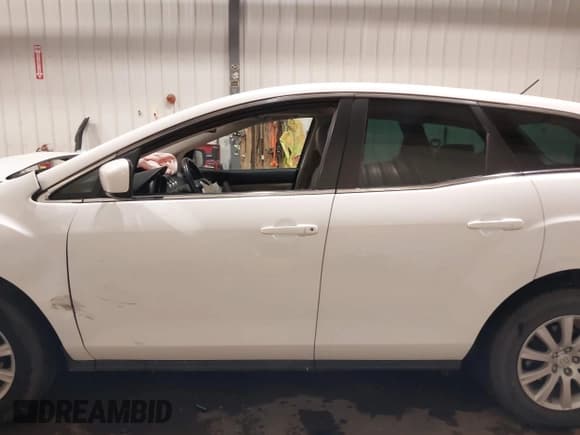 ✅ 2012 Mazda CX-7 i Touring • VIN: JM3ER2C51C0411837 • Lot: 42023100. Wystawiony na IAAI z przebiegiem 85 112 mil. Bezpłatny archiwum sprzedaży aukcyjnych z USA i szczegółowy raport historii pojazdu na DreamBid. Zdjęcie 15.