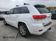 ✅ 2015 Jeep Grand Cherokee Overland • VIN: 1C4RJFCM9FC866700 • Lot: 86303435. Listed on Copart with 86,831 mi. Free auction sales archive from the USA and detailed vehicle history report at DreamBid. Image 2.
