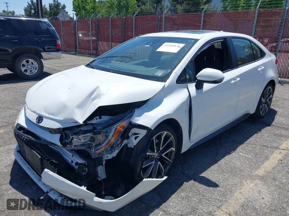 ✅ 2020 Toyota Corolla SE • VIN: JTDM4RCE9LJ045406 • Lot: 42260636. Listed on IAAI with 57,085 mi. Free auction sales archive from the USA and detailed vehicle history report at DreamBid. Image 18.