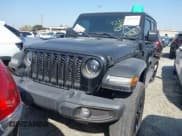 ✅ 2023 Jeep Wrangler Sahara • VIN: 1C4JJXP63PW672565 • Lot: 42831990. Listed on IAAI with 26,862 mi. Free auction sales archive from the USA and detailed vehicle history report at DreamBid. Image 13.