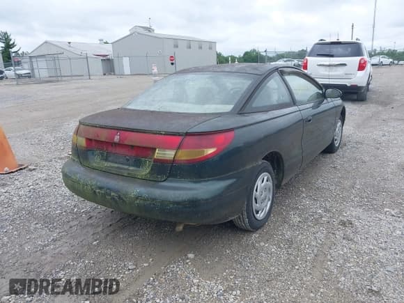 ✅ 1997 Saturn SC • VIN: 1G8ZF1285VZ100218 • Лот: 42881895. Опубликован ранее на IAAI с пробегом 114 002 миль. Бесплатный доступ к архиву аукционных продаж из США и подробный отчёт об истории автомобиля на DreamBid. Изображение 4.