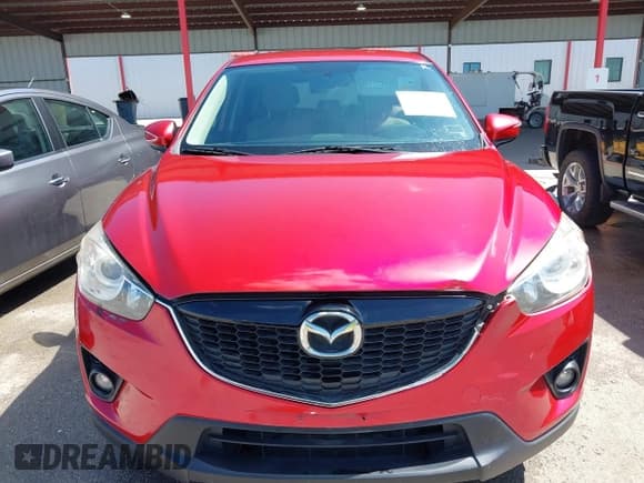 ✅ 2015 Mazda CX-5 Touring • VIN: JM3KE2CY2F0510101 • Lot: 43273950. Listed on IAAI with 128,283 mi. Free auction sales archive from the USA and detailed vehicle history report at DreamBid. Image 12.