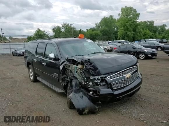 ✅ 2011 Chevrolet Suburban LS • VIN: 1GNSKHE36BR382223 • Lot: 64559285. Listed on Copart with 140,819 mi. Free auction sales archive from the USA and detailed vehicle history report at DreamBid. Image 14.