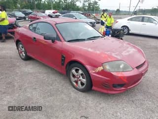 ✅ 2005 Hyundai Tiburon GS • VIN: KMHHM65D35U168510 • Лот: 42691110. Опубликован ранее на IAAI с пробегом 128 386 миль. Бесплатный доступ к архиву аукционных продаж из США и подробный отчёт об истории автомобиля на DreamBid. Изображение 1.