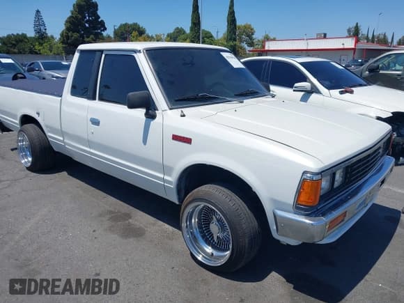 ✅ 1986 Nissan 720 • VIN: JN6ND06S6GW109456 • Lot: 42944828. Wystawiony na IAAI z przebiegiem 137 049 mil. Bezpłatny archiwum sprzedaży aukcyjnych z USA i szczegółowy raport historii pojazdu na DreamBid. Zdjęcie 1.