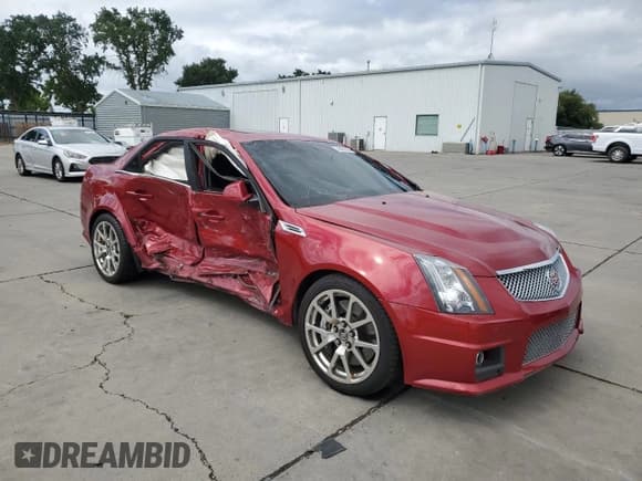 ✅ 2009 Cadillac CTS-V • VIN: 1G6DN57P590153153 • Lot: 56506585. Listed on Copart with 74,478 mi. Free auction sales archive from the USA and detailed vehicle history report at DreamBid. Image 4.