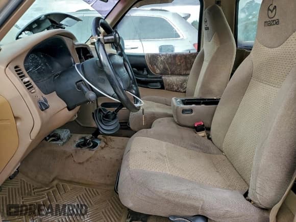 ✅ 1999 Mazda B-Series SX • VIN: 4F4YR12C7XTM22336 • Lot: 93998875. Listed on Copart with 304,120 mi. Free auction sales archive from the USA and detailed vehicle history report at DreamBid. Image 7.