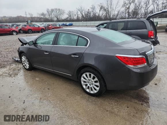 ✅ 2013 Buick LaCrosse Leather • VIN: 1G4GC5E35DF245056 • Lot: 93257535. Wystawiony na Copart z przebiegiem 204 562 mil. Bezpłatny archiwum sprzedaży aukcyjnych z USA i szczegółowy raport historii pojazdu na DreamBid. Zdjęcie 2.