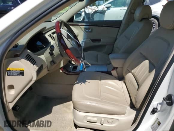 2007 Hyundai Azera SE с VIN KMHFC46FX7A177143, выставлен на аукционе Copart как лот 57519425 с пробегом 104 711 миль миль и Списание • Salvage title. История ставок и продаж доступна на DreamBid. Изображение 7.