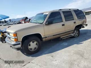 1999 Chevrolet Tahoe Z71 с VIN 1GNEK13R0XJ361210, выставлен на аукционе Copart как лот 65560725 с пробегом 196 208 миль миль и Списание • Salvage title. История ставок и продаж доступна на DreamBid. Изображение 1.
