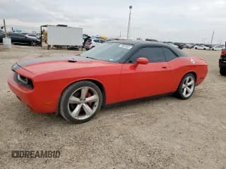✅ 2009 Dodge Challenger SRT-8 • VIN: 2B3LJ74W49H549308 • Lot: 70901665. Listed on Copart with 84,813 mi. Free auction sales archive from the USA and detailed vehicle history report at DreamBid. Image 1.