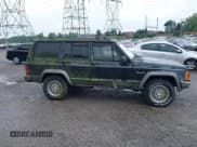 ✅ 1996 Jeep Cherokee • VIN: IJ4FJ78S0TL234609 • Lot: 42636385. Listed on IAAI with 163,885 mi. Free auction sales archive from the USA and detailed vehicle history report at DreamBid. Image 14.