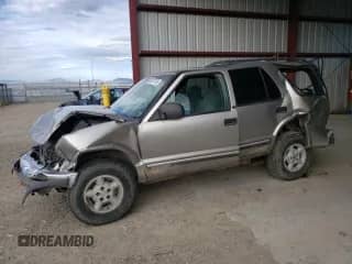 2000 Chevrolet Blazer LS с VIN 1GNDT13W9Y2358557, выставлен на аукционе Copart как лот 65917743 с пробегом Не указан миль и Чистый • Clean title. История ставок и продаж доступна на DreamBid. Изображение 1.