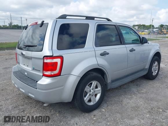 ✅ 2011 Ford Escape Hybrid • VIN: 1FMCU4K3XBKC60103 • Lot: 42048614. Wystawiony na IAAI z przebiegiem 125 354 mil. Bezpłatny archiwum sprzedaży aukcyjnych z USA i szczegółowy raport historii pojazdu na DreamBid. Zdjęcie 4.