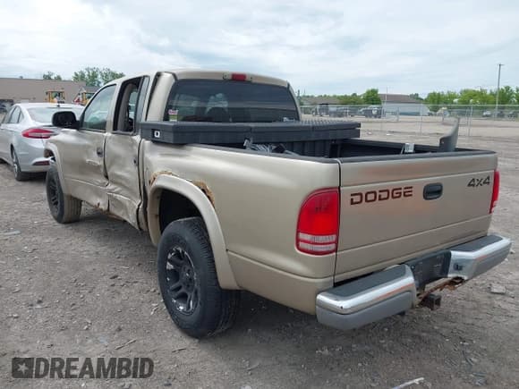 ✅ 2002 Dodge Dakota SLT • VIN: 1B7HG48N32S721409 • Lot: 42295499. Wystawiony na IAAI z przebiegiem 183 991 mil. Bezpłatny archiwum sprzedaży aukcyjnych z USA i szczegółowy raport historii pojazdu na DreamBid. Zdjęcie 3.