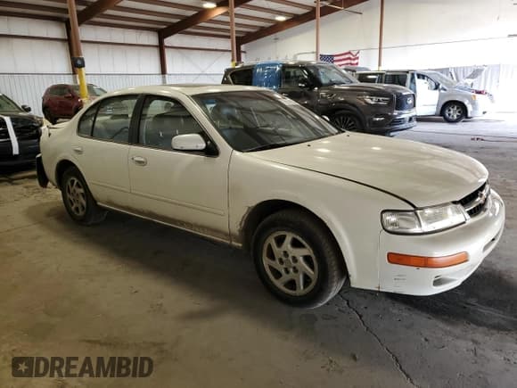 ✅ 1999 Nissan Maxima GXE • VIN: JN1CA21A6XT100211 • Lot: 78516634. Listed on Copart with 102,344 mi. Free auction sales archive from the USA and detailed vehicle history report at DreamBid. Image 4.