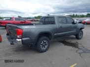✅ 2017 Toyota Tacoma SR5 • VIN: 3TMDZ5BN3HM027098 • Lot: 42409977. Listed on IAAI with 97,224 mi. Free auction sales archive from the USA and detailed vehicle history report at DreamBid. Image 4.
