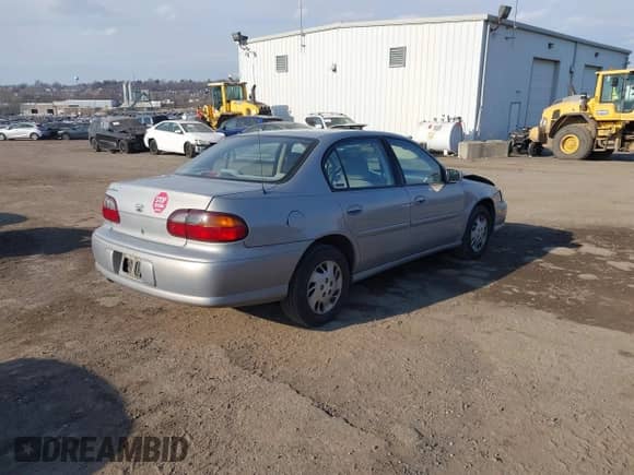 1998 Chevrolet Malibu z VIN 1G1ND52M2W6166719, wystawiony jako IAAI lot #41677518 z przebiegiem 116 689 mil mil oraz . Historia ofert i sprzedaży dostępna na DreamBid. Obrazek 4.