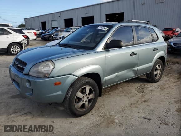 2008 Hyundai Tucson GLS with VIN KM8JM12B98U734567, listed as a Copart auction lot 79539044 with 193,738 mi miles and Salvage title. Bid and sale history available at DreamBid. Image 1.