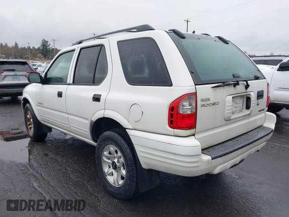 ✅ 2004 Isuzu Rodeo S • VIN: 4S2CK58Y244308949 • Lot: 41696812. Listed on IAAI with 132,894 mi. Free auction sales archive from the USA and detailed vehicle history report at DreamBid. Image 3.