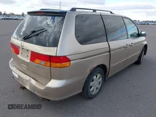 ✅ 2002 Honda Odyssey EX-L • VIN: 2HKRL18072H589529 • Lot: 43584660. Wystawiony na IAAI z przebiegiem 280 483 mil. Bezpłatny archiwum sprzedaży aukcyjnych z USA i szczegółowy raport historii pojazdu na DreamBid. Zdjęcie 4.