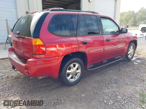 ✅ 2002 GMC Envoy SLT • VIN: 1GKDT13S122366847 • Lot: 42838323. Listed on IAAI with 132,295 mi. Free auction sales archive from the USA and detailed vehicle history report at DreamBid. Image 4.