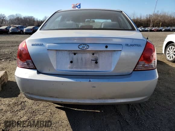 2005 Hyundai Elantra GLS z VIN KMHDN46D15U065617, wystawiony jako Copart lot #80891964 z przebiegiem 187 401 mil mil oraz Szkoda całkowita • Salvage title. Historia ofert i sprzedaży dostępna na DreamBid. Obrazek 6.