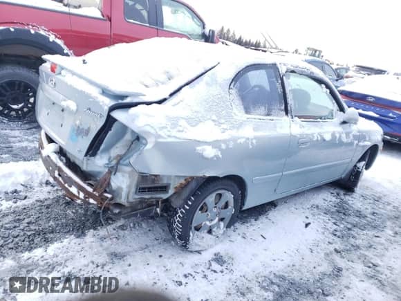 2004 Hyundai Accent GL z VIN KMHCG35C04U314674, wystawiony jako Copart lot #86047454 z przebiegiem 65 705 mil mil oraz Szkoda całkowita • Salvage title. Historia ofert i sprzedaży dostępna na DreamBid. Obrazek 3.