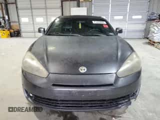 ✅ 2008 Hyundai Tiburon GT • VIN: KMHHN66F18U280756 • Лот: 81469935. Опубликован ранее на Copart с пробегом 227 955 миль. Бесплатный доступ к архиву аукционных продаж из США и подробный отчёт об истории автомобиля на DreamBid. Изображение 5.