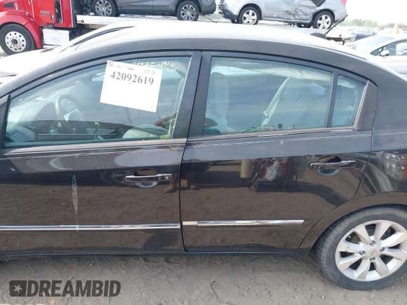 ✅ 2011 Nissan Sentra SL • VIN: 3N1AB6AP5BL653963 • Lot: 42092619. Listed on IAAI with 167,741 mi. Free auction sales archive from the USA and detailed vehicle history report at DreamBid. Image 14.