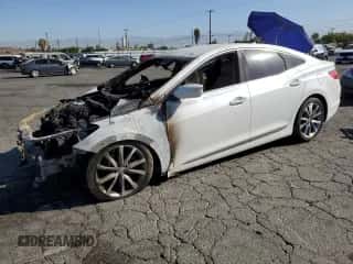2015 Hyundai Azera z VIN KMHFG4JG2FA477780, wystawiony jako Copart lot #67327954 z przebiegiem Nie podano mil oraz Nie do naprawy • Non repairable. Historia ofert i sprzedaży dostępna na DreamBid. Obrazek 1.