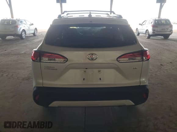 ✅ 2023 Toyota Corolla Cross LE • VIN: 7MUBAAAG8PV071516 • Lot: 87414505. Wystawiony na Copart z przebiegiem 35 598 mil. Bezpłatny archiwum sprzedaży aukcyjnych z USA i szczegółowy raport historii pojazdu na DreamBid. Zdjęcie 6.