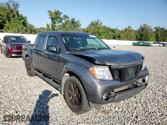 ✅ 2020 Nissan Frontier SV • VIN: 1N6ED0EA7LN727779 • Lot: 82690695. Listed on Copart with 82,785 mi. Free auction sales archive from the USA and detailed vehicle history report at DreamBid. Image 13.