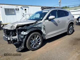 ✅ 2024 Mazda CX-5 S Premium Plus • VIN: JM3KFBEL8R0467239 • Лот: 70073165. Опубликован ранее на Copart с пробегом 7 107 миль. Бесплатный доступ к архиву аукционных продаж из США и подробный отчёт об истории автомобиля на DreamBid. Изображение 1.