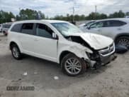 ✅ 2014 Dodge Journey SXT • VIN: 3C4PDCBG4ET140996 • Lot: 70204894. Listed on Copart with 94,668 mi. Free auction sales archive from the USA and detailed vehicle history report at DreamBid. Image 4.