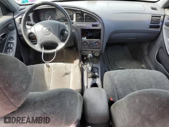 2003 Hyundai Elantra GLS с VIN KMHDN45D63U610290, выставлен на аукционе Copart как лот 71979604 с пробегом 163 753 миль миль и Чистый • Clean title. История ставок и продаж доступна на DreamBid. Изображение 8.