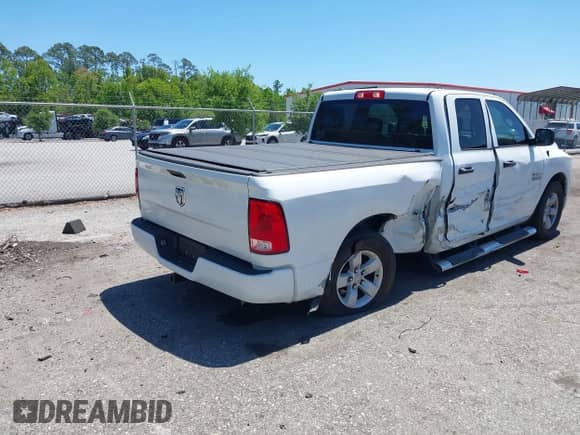 2018 Ram 1500 Tradesman with VIN 1C6RR6FG6JS341159, listed as a IAAI auction lot 42046090 with 108,083 mi miles and . Bid and sale history available at DreamBid. Image 4.