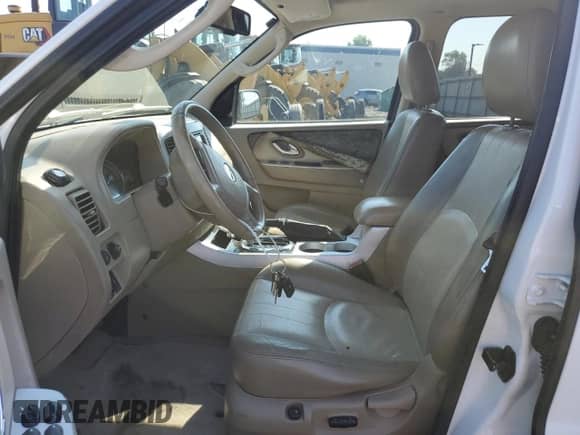 2007 Mercury Mariner Premier с VIN 4M2CU97107KJ12925, выставлен на аукционе Copart как лот 62371895 с пробегом 141 576 миль миль и Списание • Salvage title. История ставок и продаж доступна на DreamBid. Изображение 7.