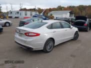 ✅ 2016 Ford Fusion Titanium • VIN: 3FA6P0K92GR255413 • Lot: 43562538. Wystawiony na IAAI z przebiegiem 158 257 mil. Bezpłatny archiwum sprzedaży aukcyjnych z USA i szczegółowy raport historii pojazdu na DreamBid. Zdjęcie 4.