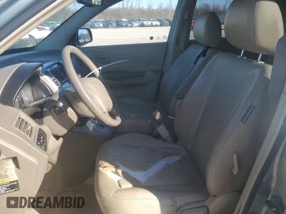 2007 Hyundai Tucson SE z VIN KM8JN72D07U520633, wystawiony jako Copart lot #83490684 z przebiegiem 201 559 mil mil oraz Szkoda całkowita • Salvage title. Historia ofert i sprzedaży dostępna na DreamBid. Obrazek 7.