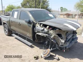 ✅ 2023 GMC Canyon 4WD AT4 • VIN: 1GTP6DEK5P1231432 • Lot: 41785102. Listed on IAAI with 33,154 mi. Free auction sales archive from the USA and detailed vehicle history report at DreamBid. Image 1.