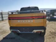 ✅ 2023 Rivian R1T Adventure • VIN: 7FCTGAAA8PN022857 • Lot: 63064315. Listed on Copart with 40,379 mi. Free auction sales archive from the USA and detailed vehicle history report at DreamBid. Image 6.