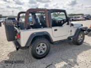 ✅ 2005 Jeep Wrangler SE • VIN: 1J4FA29125P377663 • Lot: 70550425. Wystawiony na Copart z przebiegiem 121 220 mil. Bezpłatny archiwum sprzedaży aukcyjnych z USA i szczegółowy raport historii pojazdu na DreamBid. Zdjęcie 3.