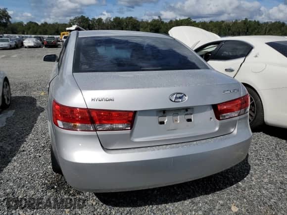 2006 Hyundai Sonata GLS с VIN KMHEU46C76A147417, выставлен на аукционе Copart как лот 74259444 с пробегом Не указан миль и Списание • Salvage title. История ставок и продаж доступна на DreamBid. Изображение 6.