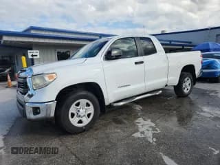 ✅ 2014 Toyota Tundra SR • VIN: 5TFRM5F17EX081909 • Lot: 87435275. Listed on Copart with 211,474 mi. Free auction sales archive from the USA and detailed vehicle history report at DreamBid. Image 1.