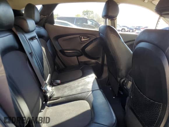 2014 Hyundai Tucson SE z VIN KM8JU3AG1EU824431, wystawiony jako Copart lot #82543985 z przebiegiem 124 792 mil mil oraz Czysty tytuł • Clean title. Historia ofert i sprzedaży dostępna na DreamBid. Obrazek 11.