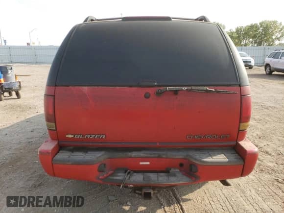 2003 Chevrolet Blazer LS z VIN 1GNDT13X83K135413, wystawiony jako Copart lot #71185894 z przebiegiem Nie podano mil oraz Szkoda całkowita • Salvage title. Historia ofert i sprzedaży dostępna na DreamBid. Obrazek 6.