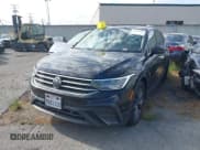 ✅ 2023 Volkswagen Tiguan SE • VIN: 3VVNB7AX2PM036365 • Lot: 43104399. Listed on IAAI with 47,443 mi. Free auction sales archive from the USA and detailed vehicle history report at DreamBid. Image 2.